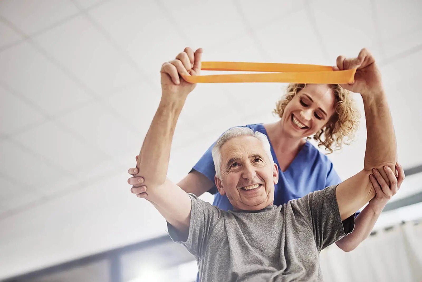 A Man Engages in Physical Therapy with a Nurse