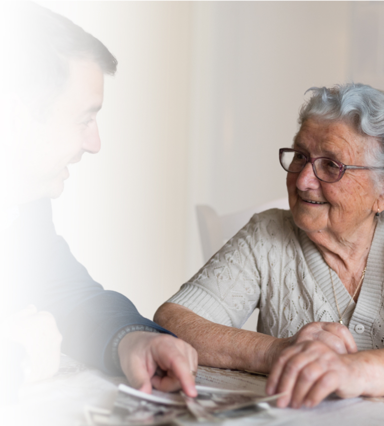 Man talking with older woman